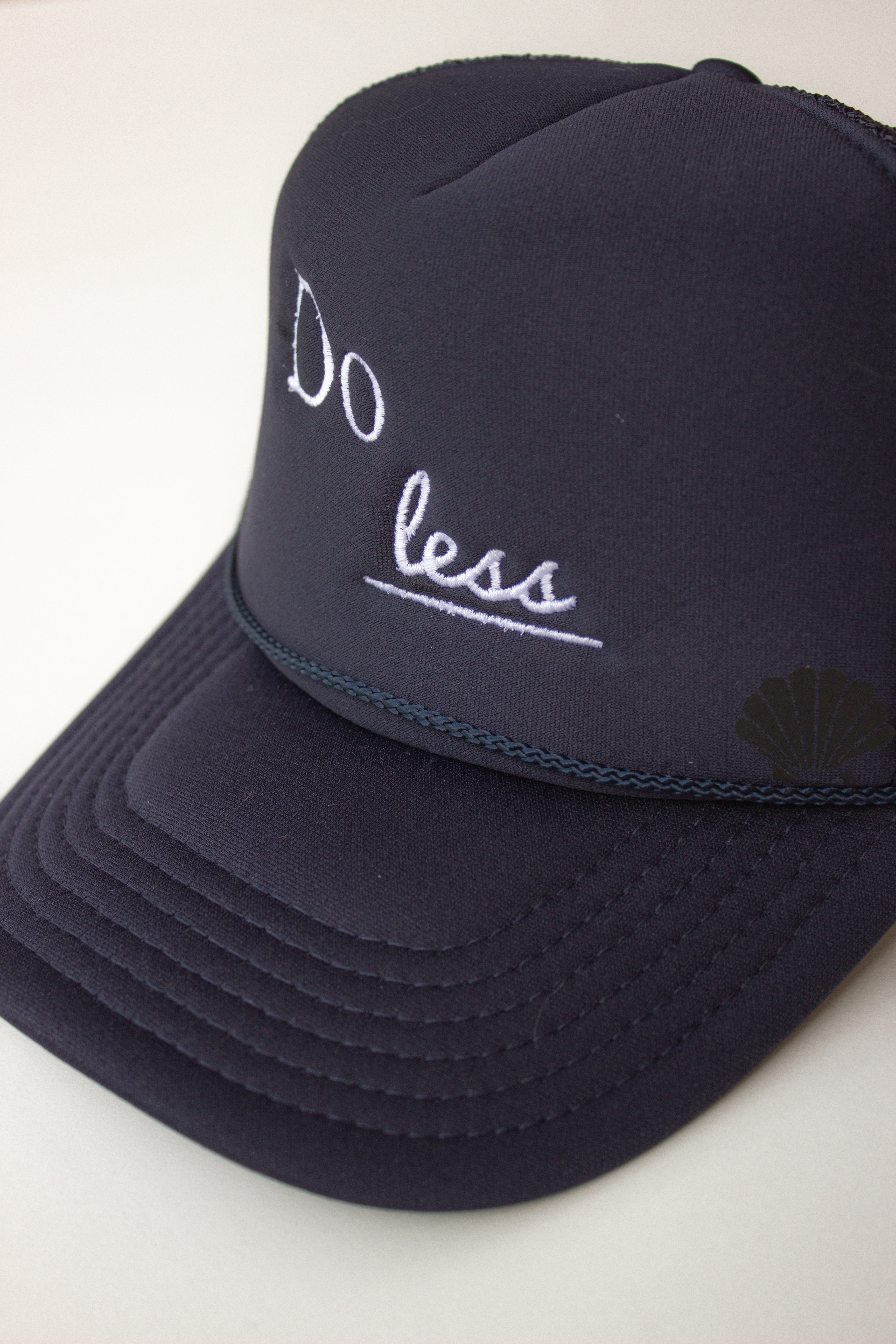 Do Less Trucker Hat