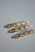 Cowrie Crest Pin